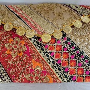 Upcycled vintage fabric clutch